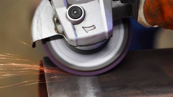 Strip disc cleaning metal.